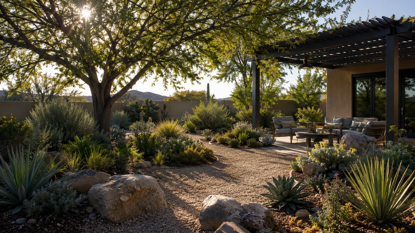 Shaded low-water backyard with drought-tolerant planting, gravel paths, a shade tree, and covered seating.