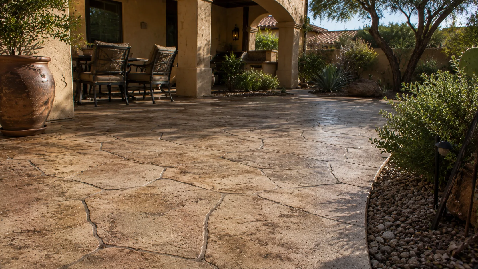 Decorative outdoor concrete courtyard where sheen, texture, and compatibility make sealing decisions more sensitive.
