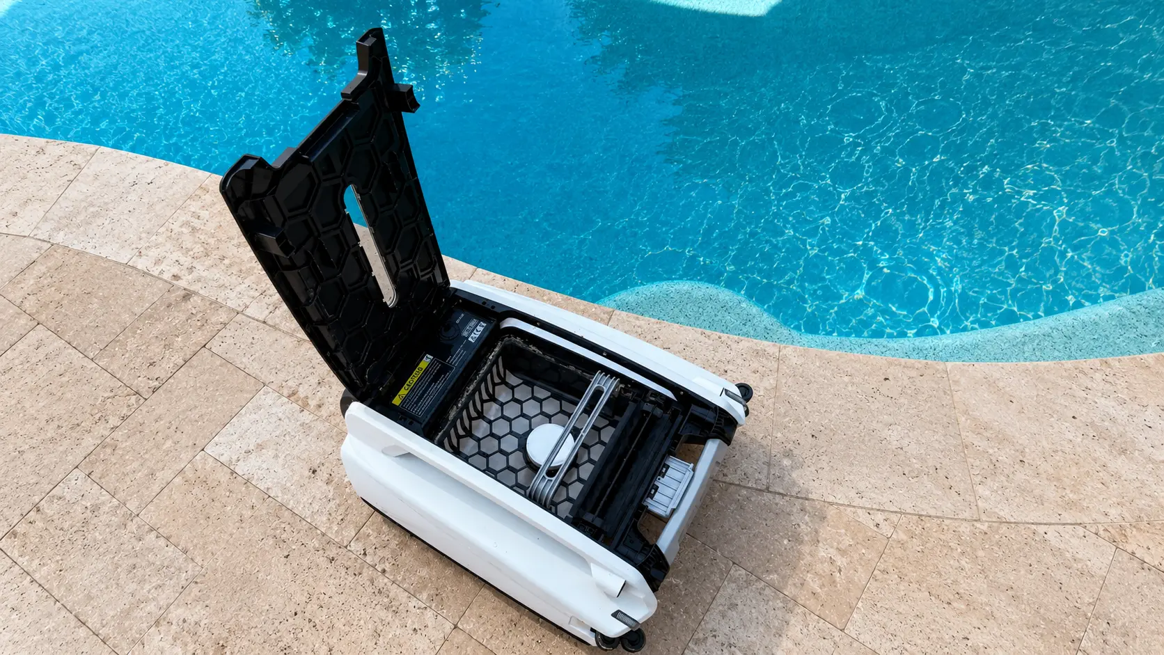 Open Betta SE debris basket showing the circular chlorine tablet holder.
